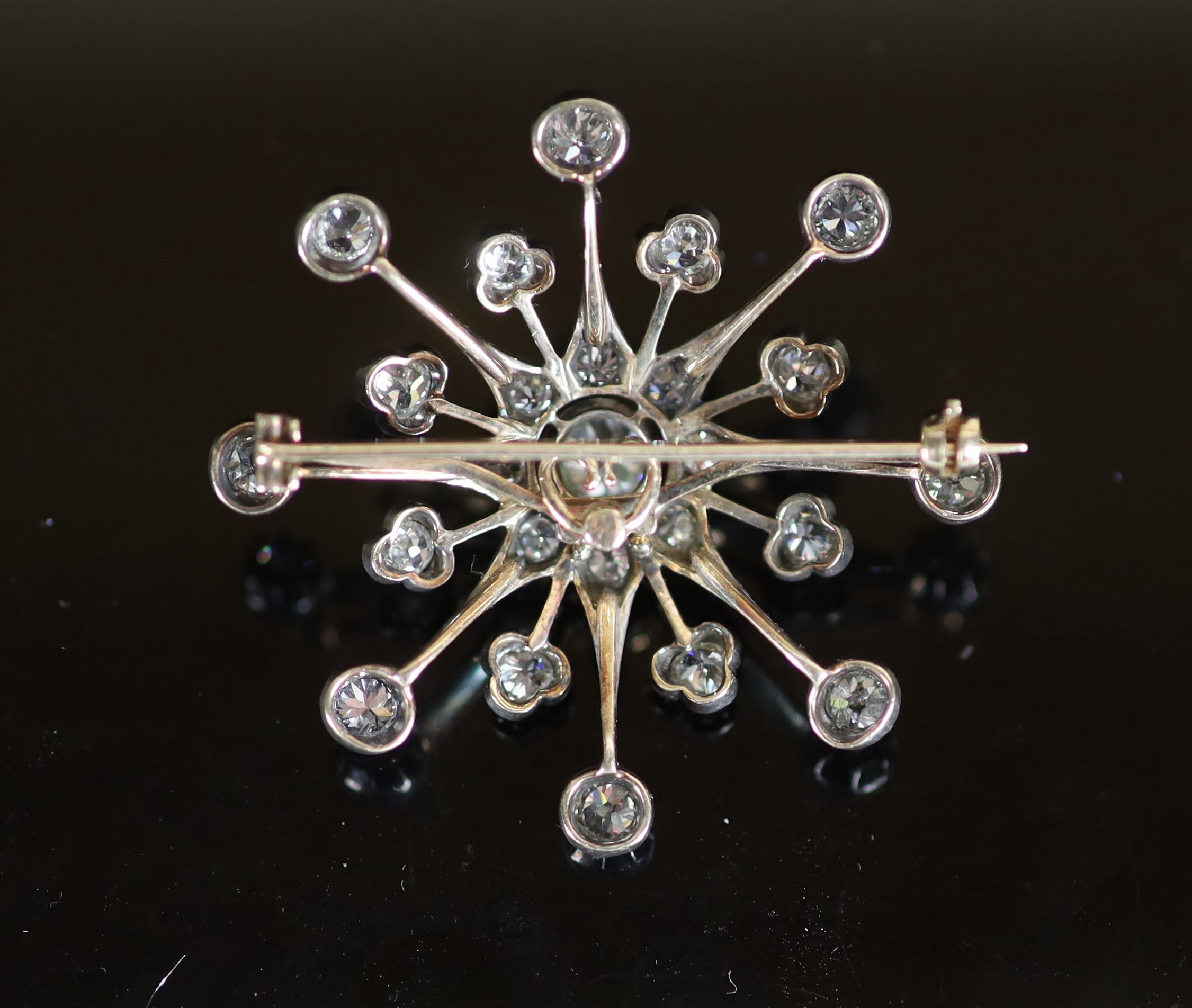 A Victorian, gold, silver and diamond set 'starburst' brooch